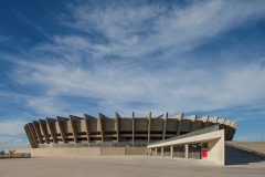 elevated forecourt and stadium volume seen from southwest